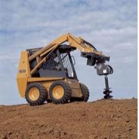 Minicargadora con taladro